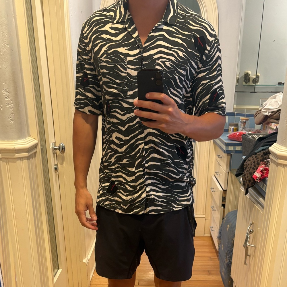 Zebra Print T-Shirt and Black Shorts